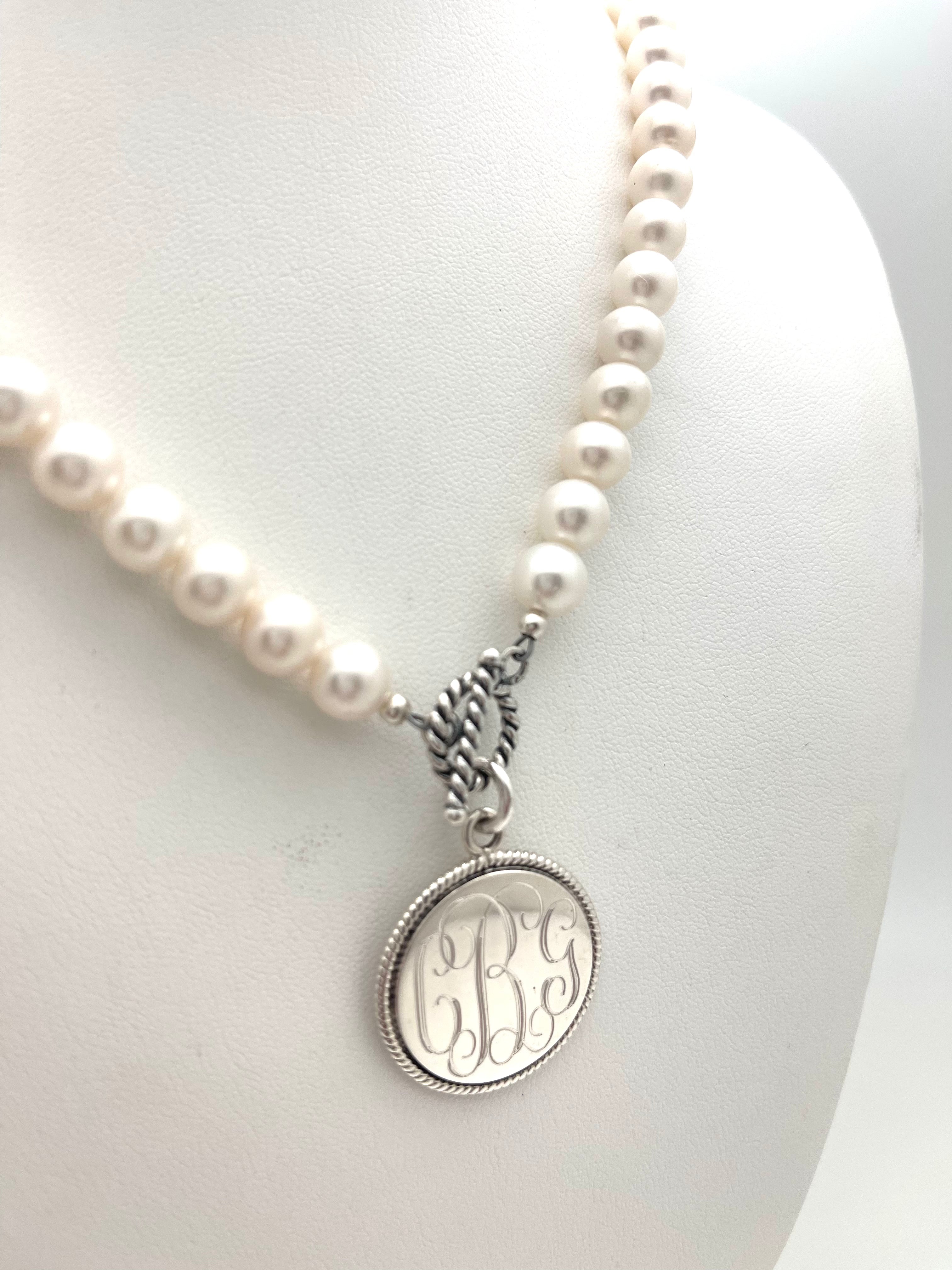Pearl necklace with monogram pendant discount
